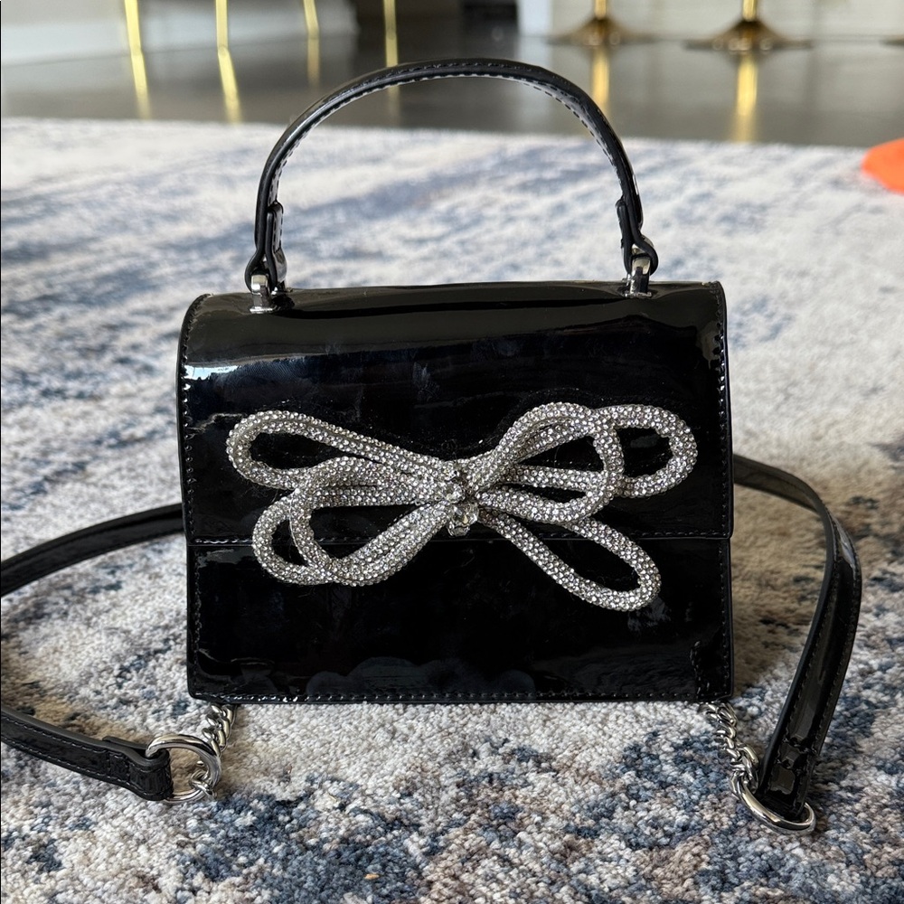 Elegant Black Handbag with Silver Bow Accent